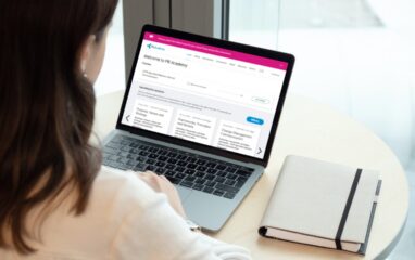image shows student looking at the PR Academy Study Hub on laptop. Picture taken over the student's shoulder