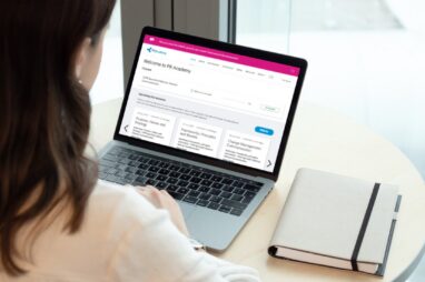 image shows student looking at the PR Academy Study Hub on laptop. Picture taken over the student's shoulder
